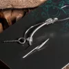Nash Fluorocarbon D-Rig 4 Cârlig legat cu ghimpe, cu ochet